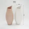 Bình hoa gốm sứ Nora trang trí decor dáng lượn sóng Made4Home - Kích thước 32x8cm