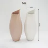 Bình hoa gốm sứ Nora trang trí decor dáng lượn sóng Made4Home - Kích thước 32x8cm